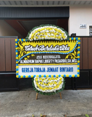 Papan Bunga Duka di Kajai